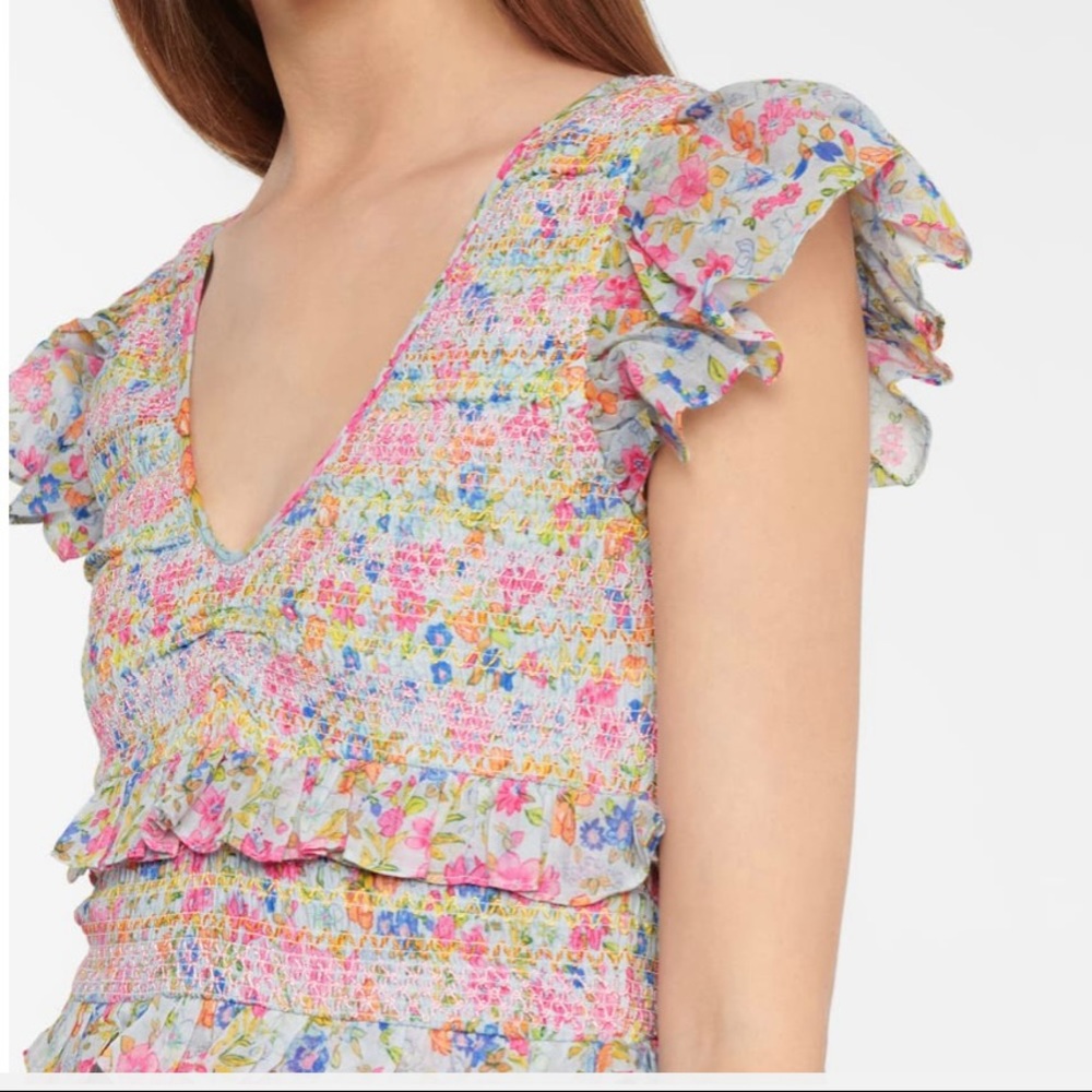 Sonora minidress from LOVESHACKFANCY has a typically beach-suitable silhouette,